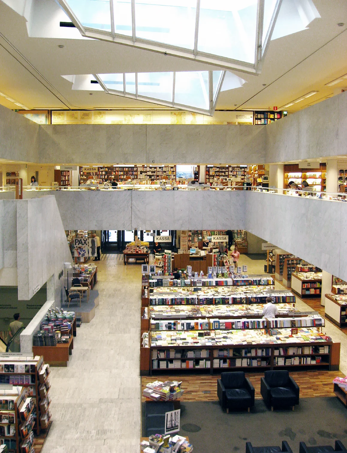 Bookstore interior with skylights and white marble balconies